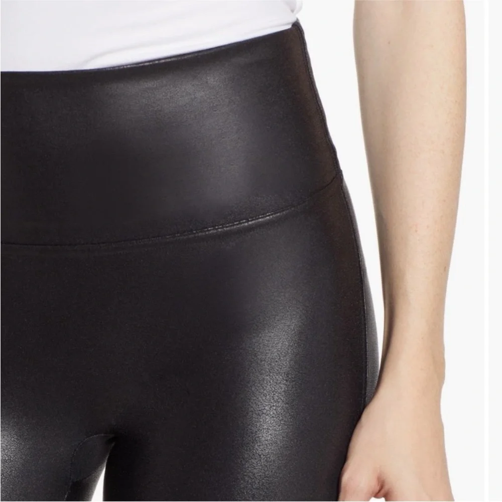 Spanx Women’s Black Faux Leather Leggings in a size Small.